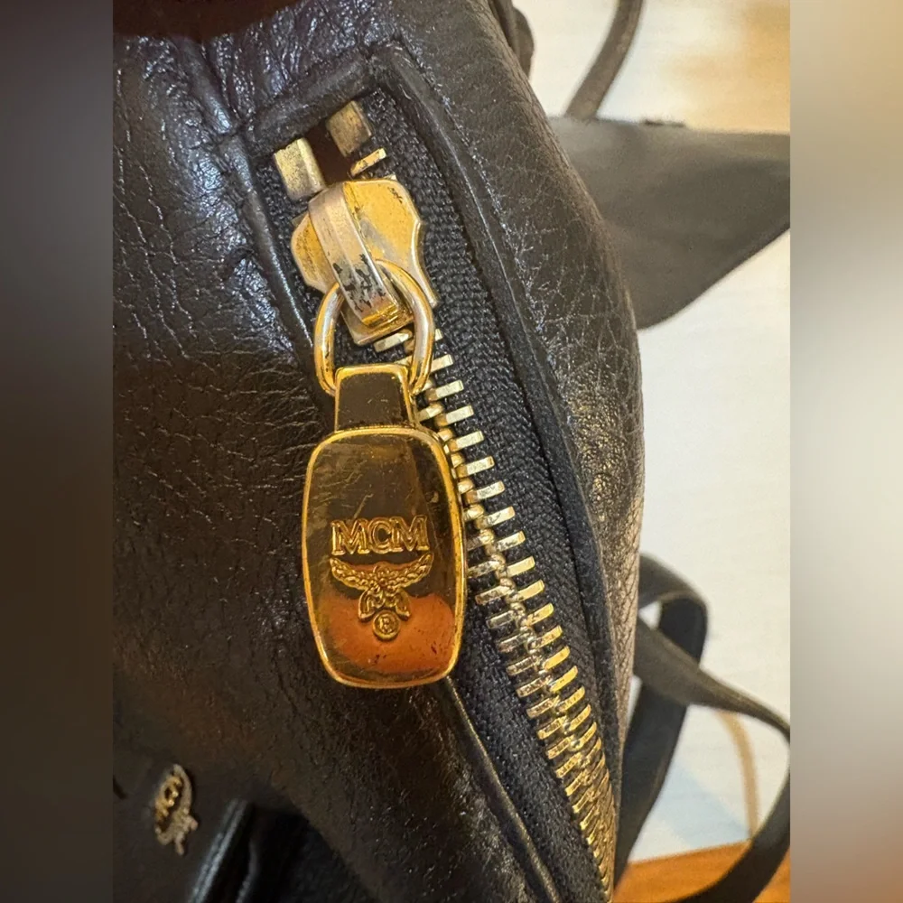 MCM‎ Black Leather Backpack with Gold Accents and draw strings 12